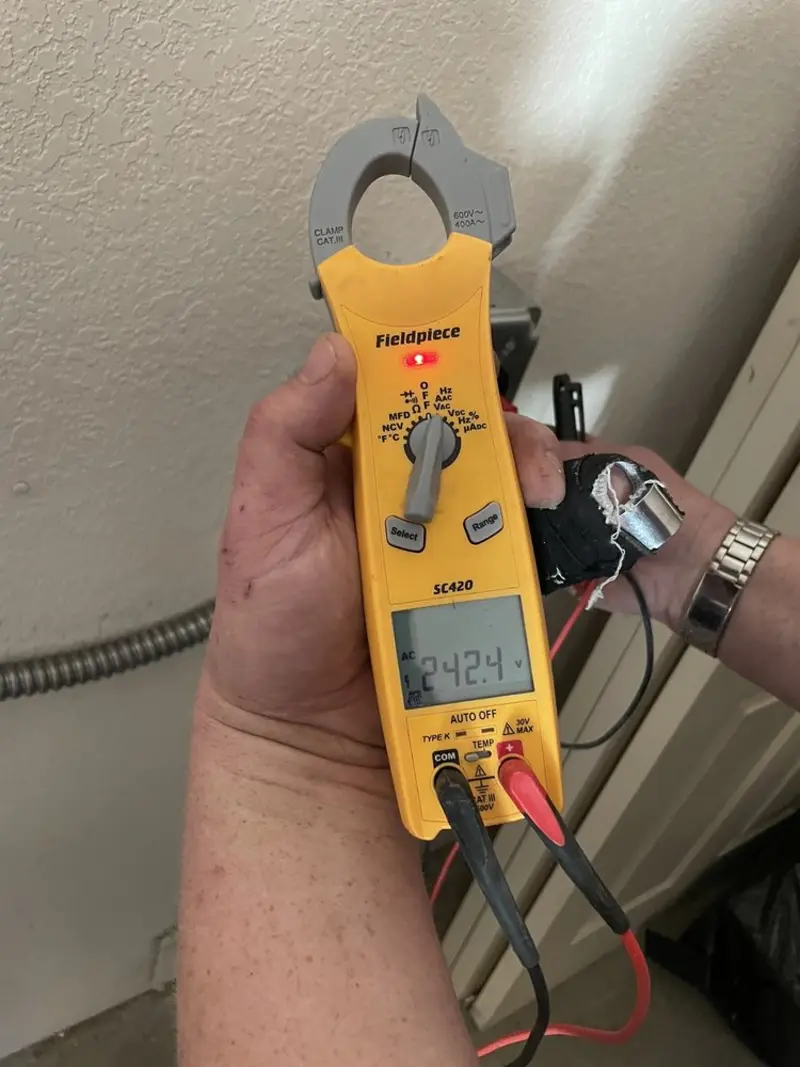 Voltage testing with clamp meter during Generator Installation in Granville